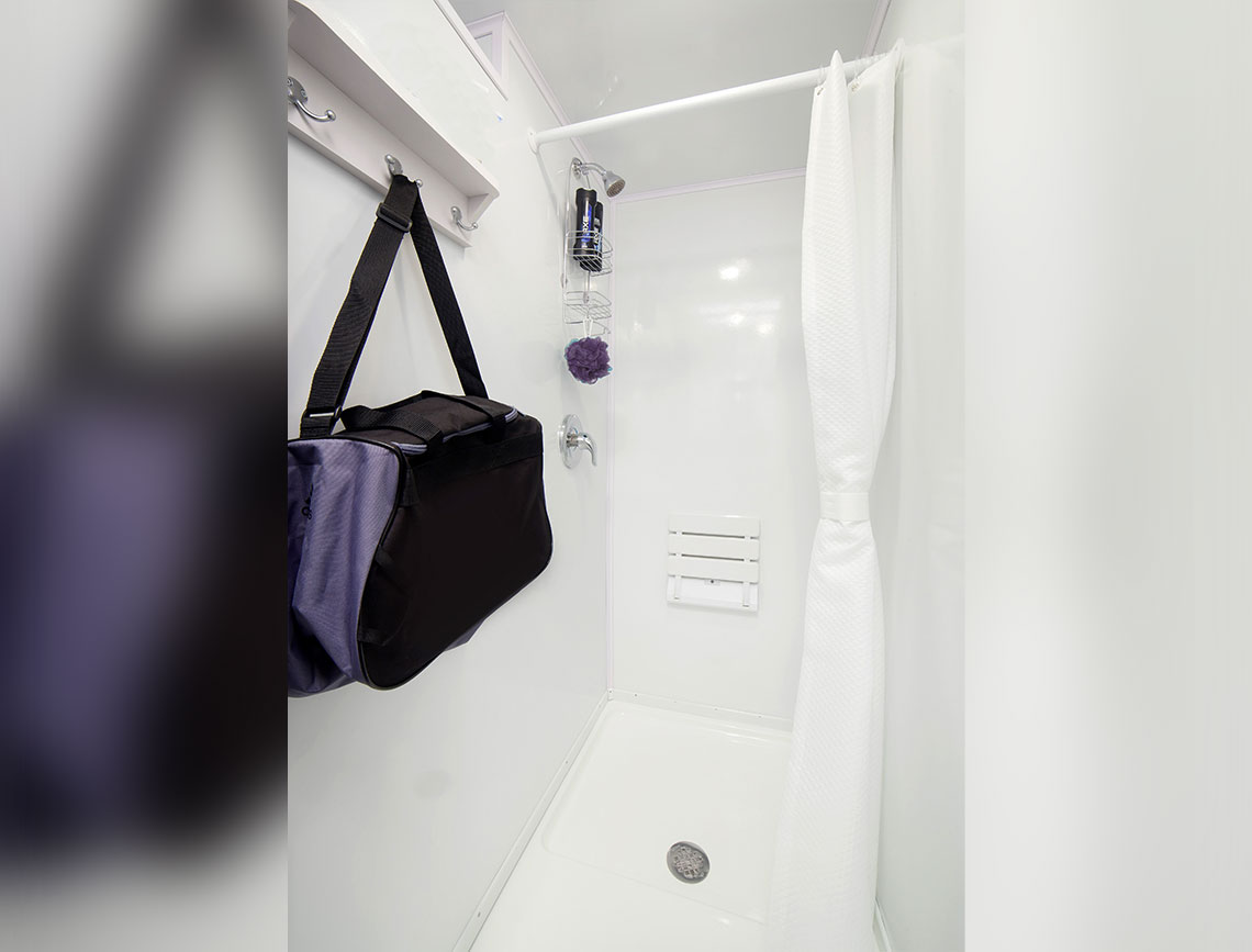 Luxurious Restrooms mobile shower trailer featuring premium comfort and sanitation for events and construction sites.